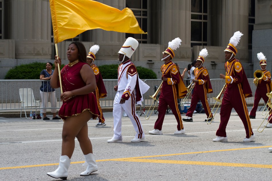 Look at the trombone player on the right.