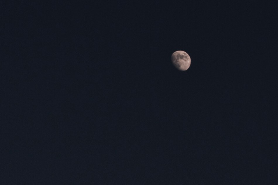 A partial moon in the sky