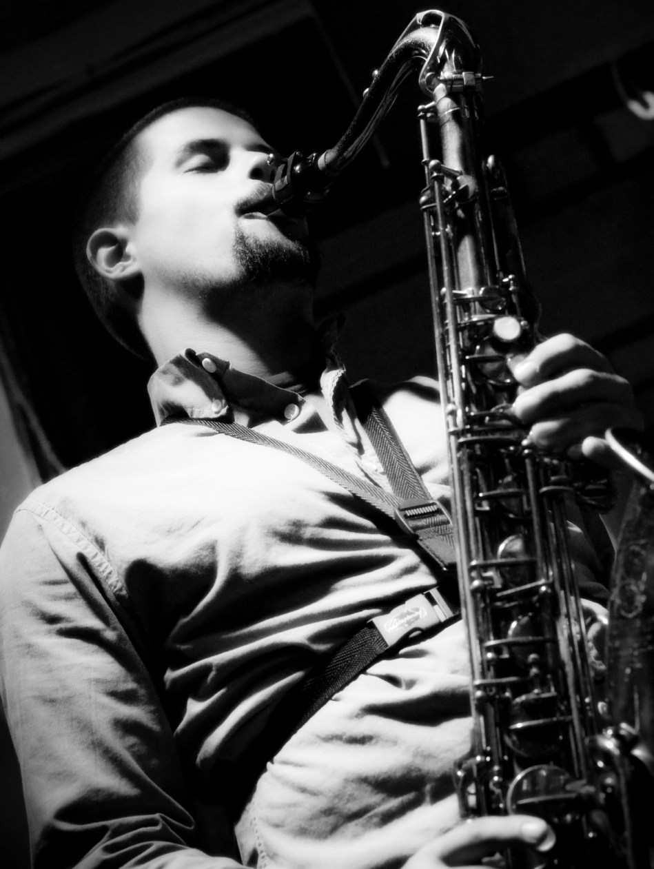 Saxophonist Bryce plays with New Orleans jazz trio Chicken & Waffles at Maison on Frenchmen in New Orleans, LA