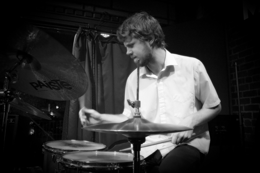 Drummer Joel plays with New Orleans jazz trio Chicken & Waffles at Maison on Frenchmen in New Orleans, Louisiana