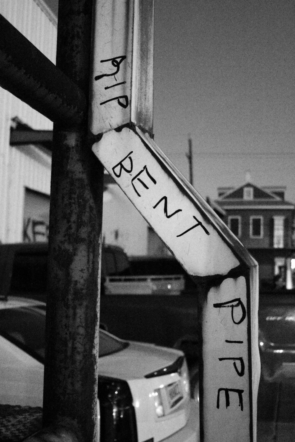 A bent pipe with graffitti RIP Bent Pipe written on it