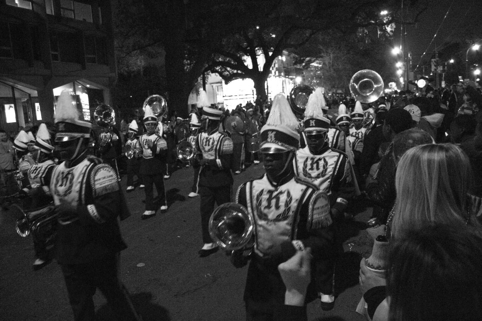 A marching Band marches in the Krewe D'Etat Mardi Gras parade in New Orleans, LA on february 8, 2013