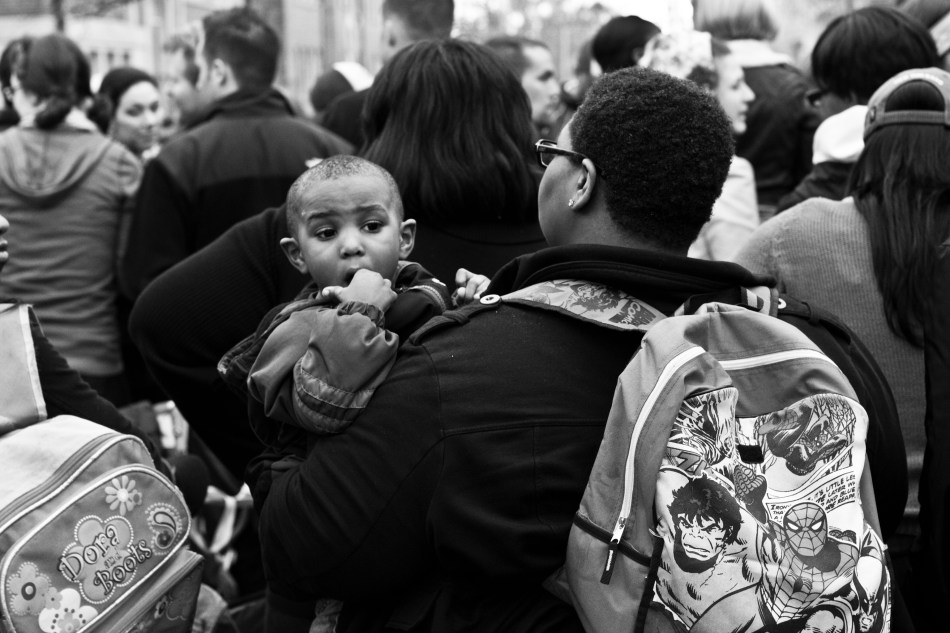 A baby and his mother at the Endymion Mardi Gras parade in New Orleans, LA on February 9, 2013