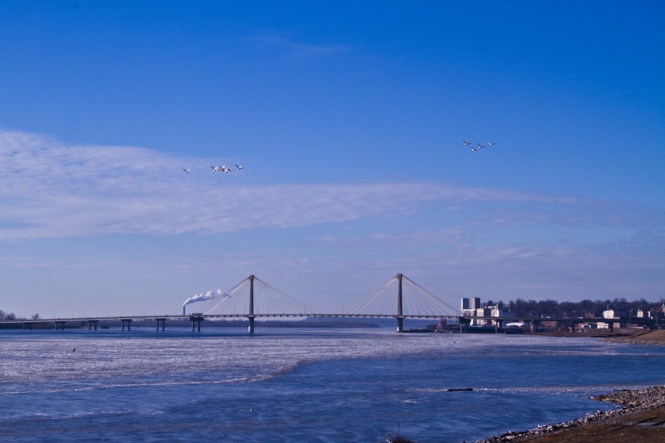 A view of the South side of Alton, Illinois, The Clark Bridge, and the Mississippi River.