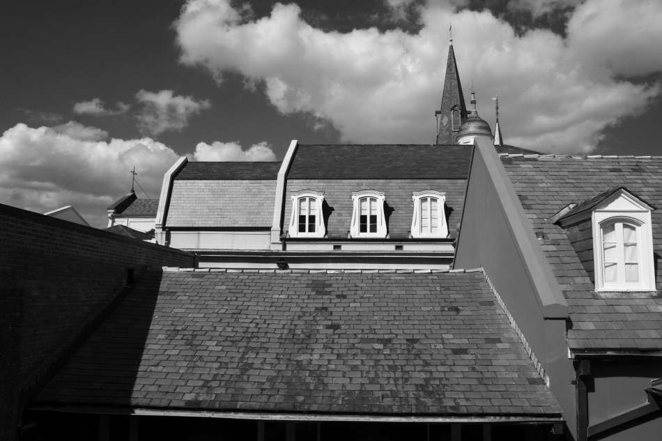 A side view of St. Louis Cathedral in the French Quarter New Orleans, LA as seen from a balcony at Chartres Street and St. Peter Street